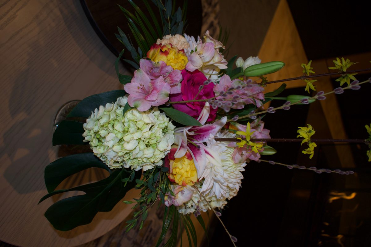 Tropical hydrangea and orchid arrangement