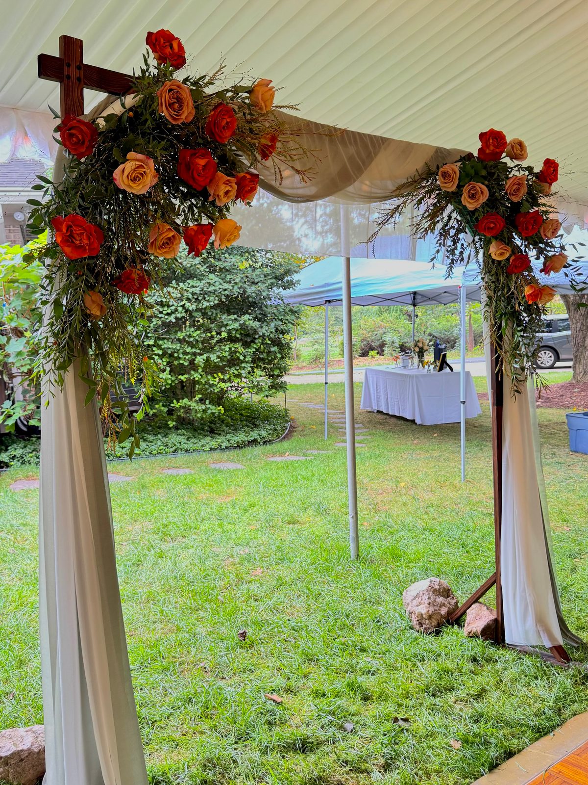 Fall wedding arch with cascading florals