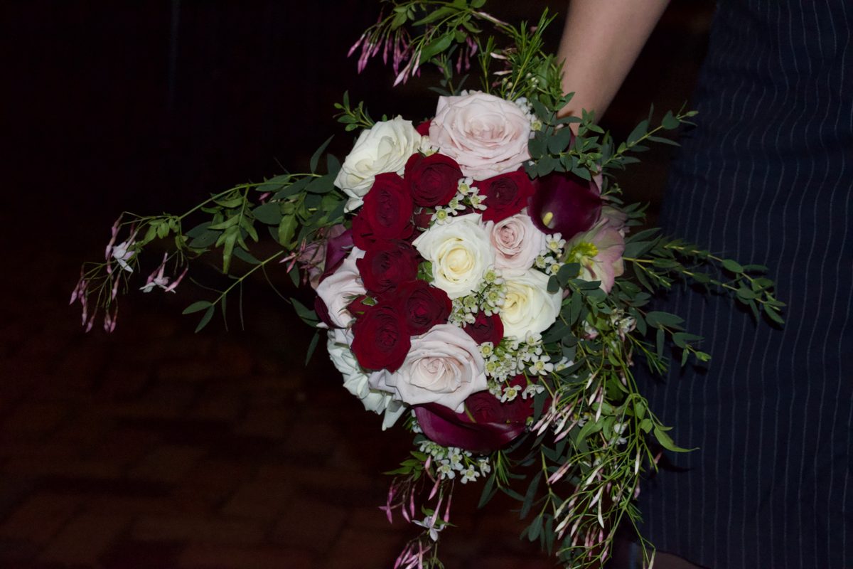 Moody romance bridal bouquet with rich burgundy blooms
