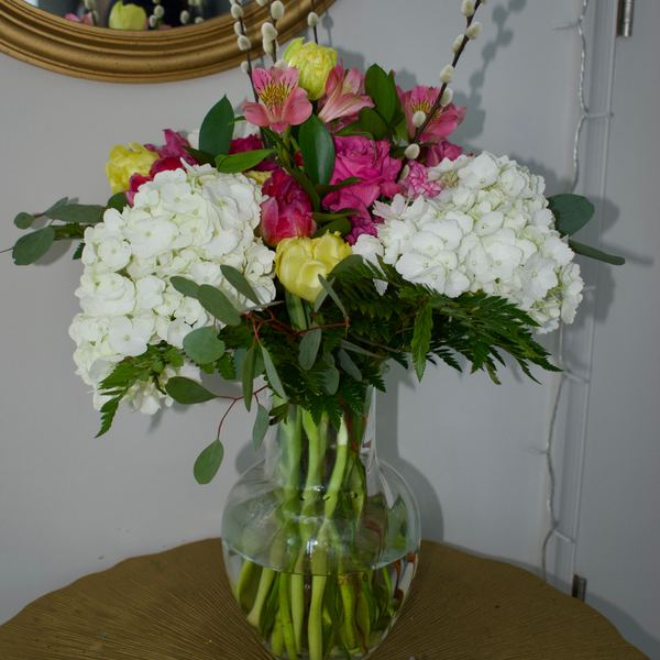 White hydrangeas with pink accents